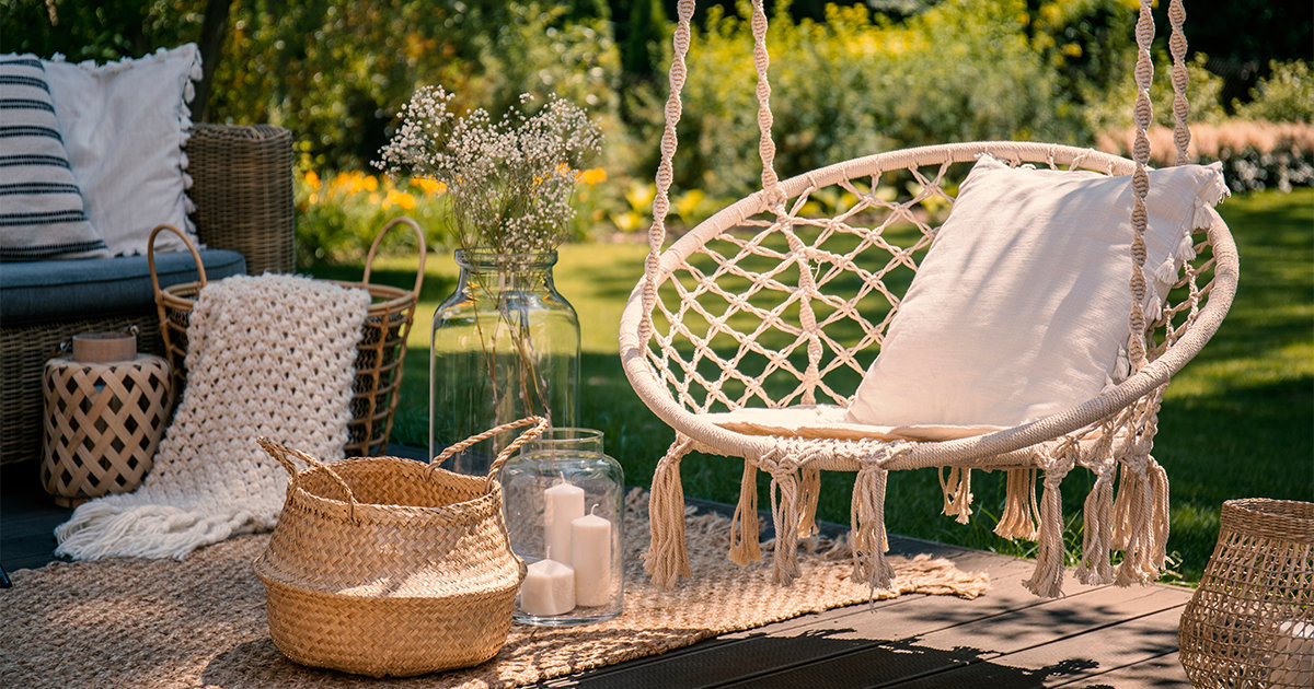 Boho swing over porch with pillow